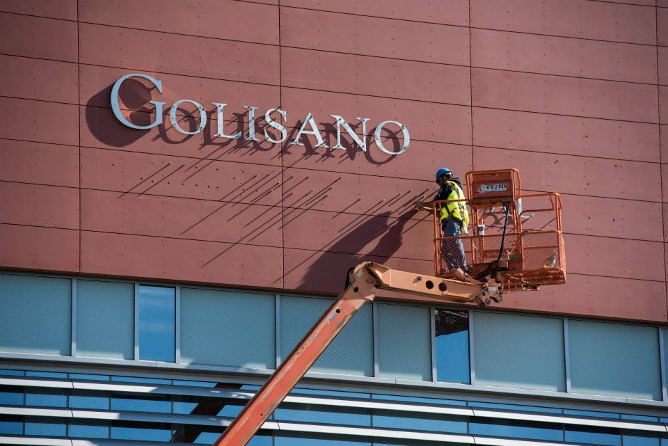 Installing Sign at Galisano